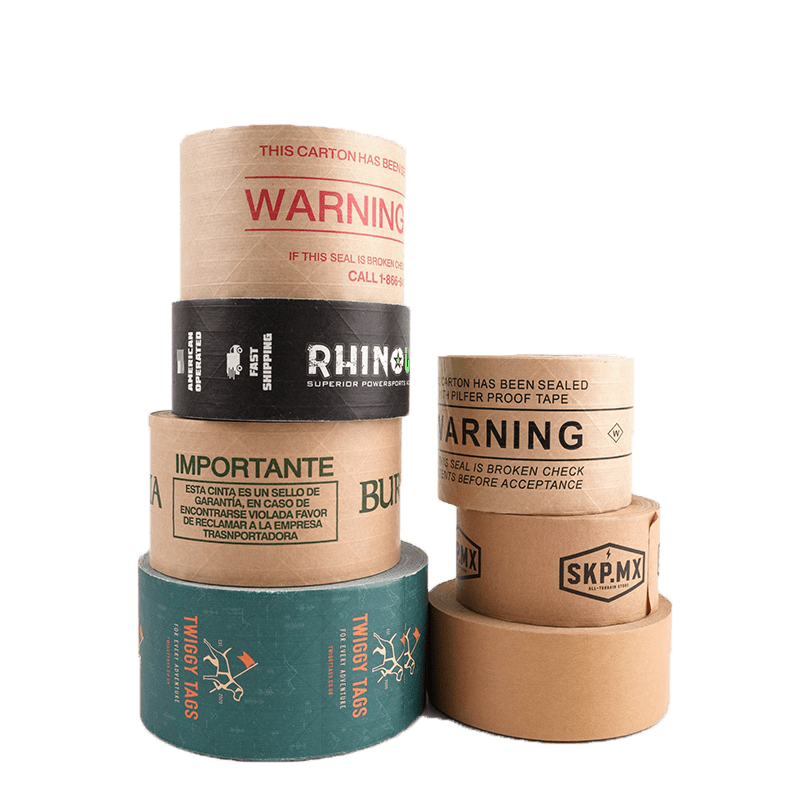 Stack of brown and black printed paper tape rolls